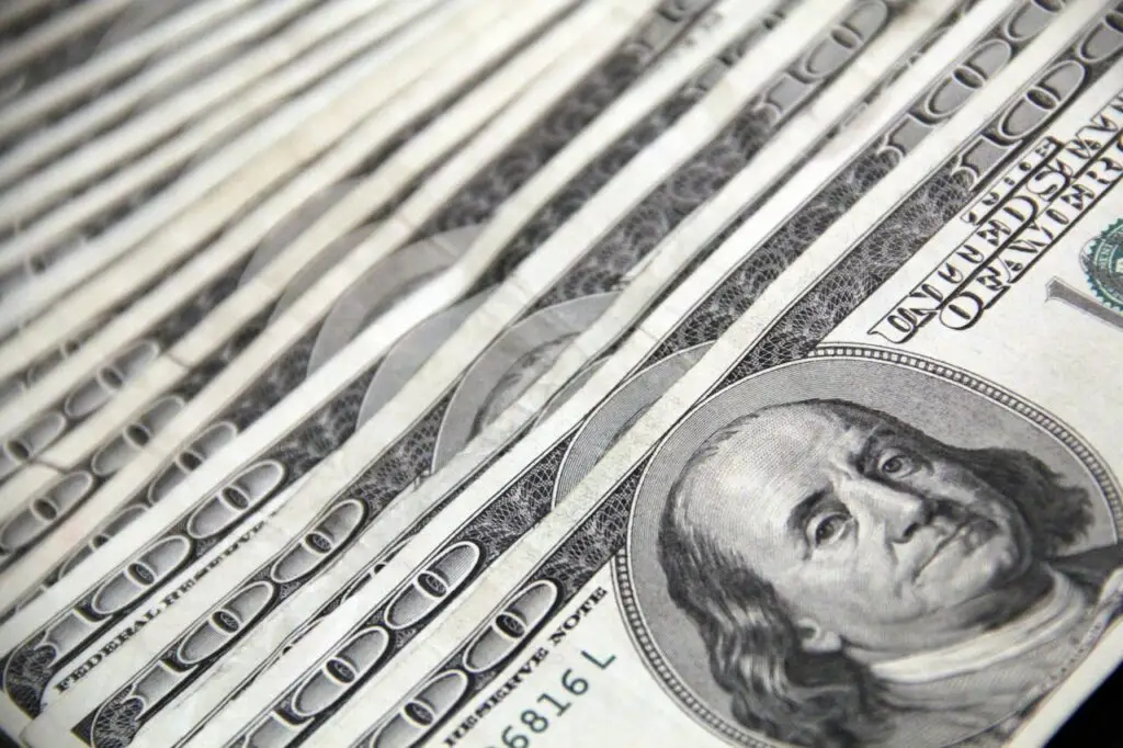 A pile of 100 dollar bills.