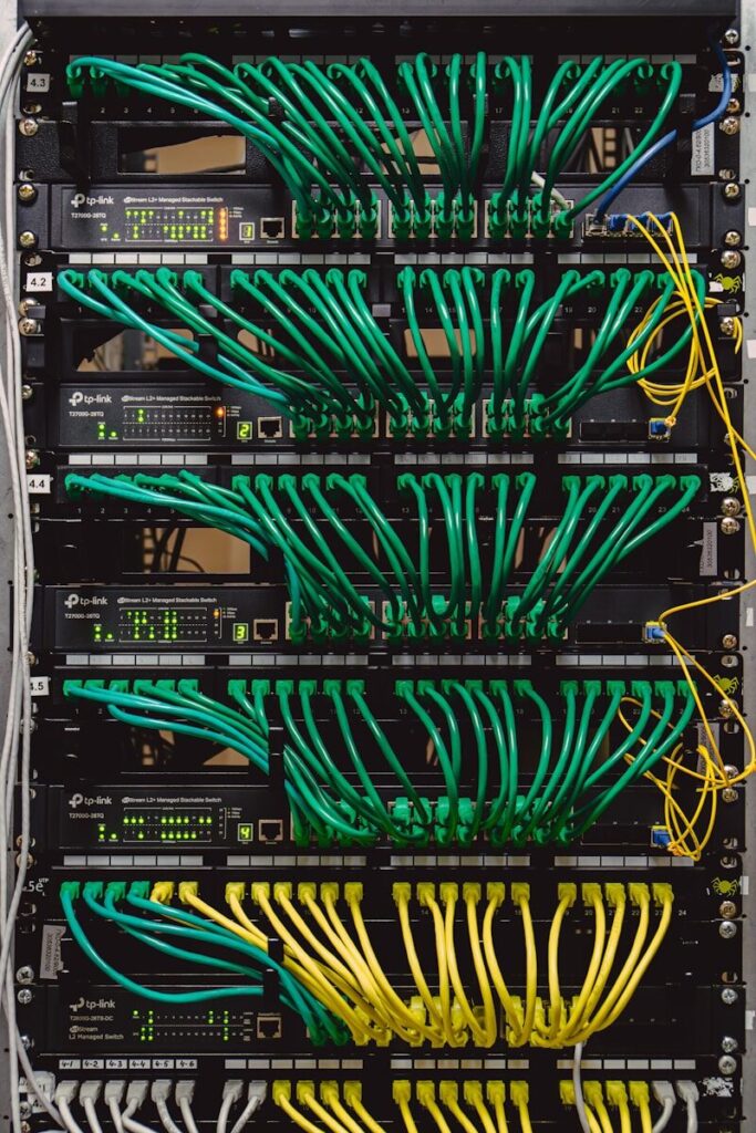 A rack with many wires and cables attached to it