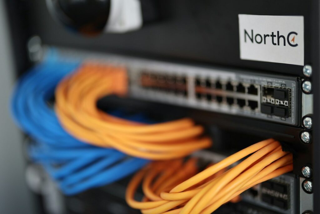 IT Closet Cleanup 1 a close up of a network switch box